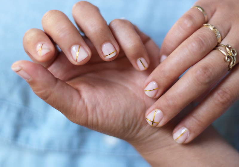 1. Pink and Gold Striped Nail Design - wide 2